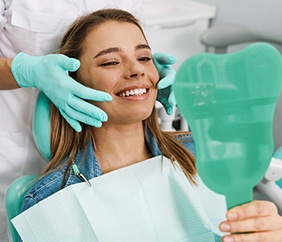 woman smiling during cosmetic consultation in Mankato
