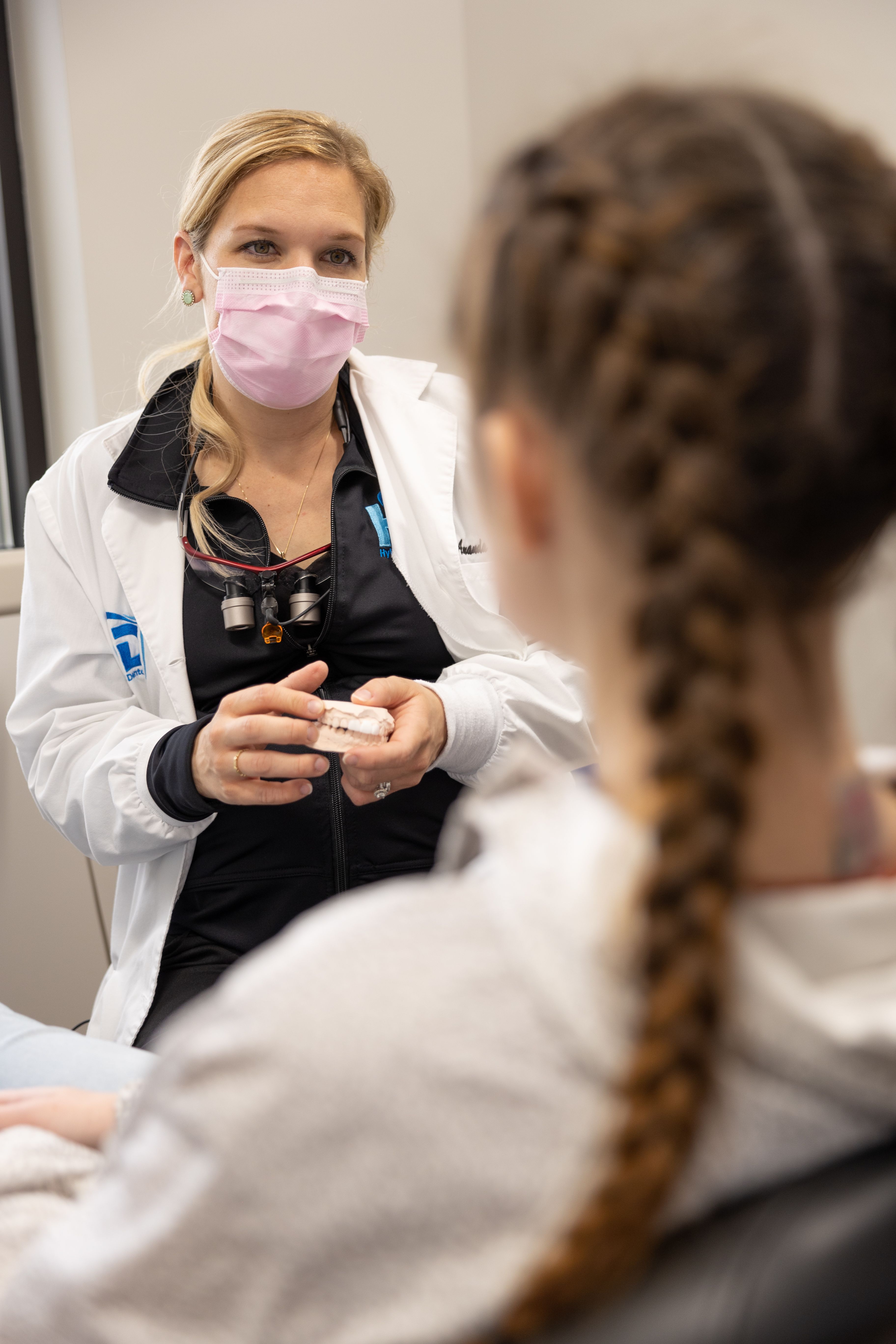 Dental team member helping patient understand how dental insurance works