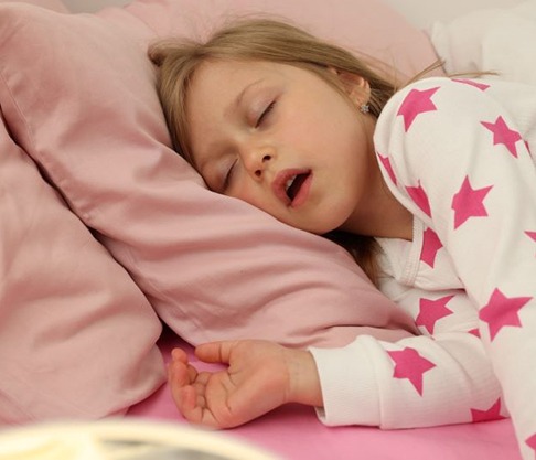 Young girl sleeping with mouth open